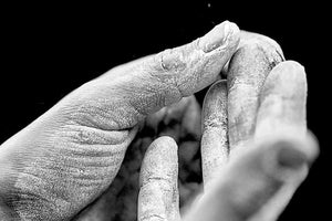 FrictionLabs Secret Stuff Hygenic Liquid Chalk on the hands